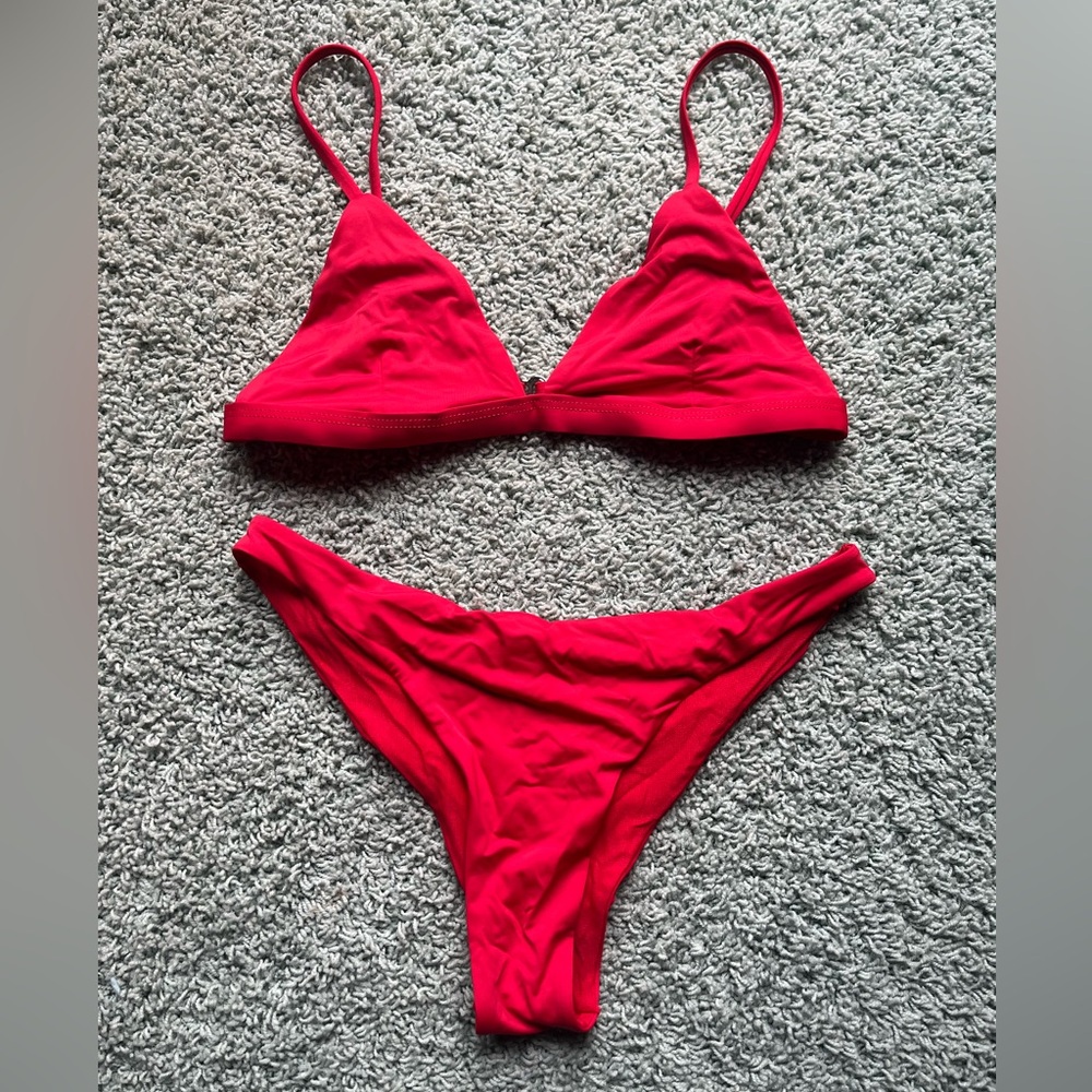 Brand: Full Tilt - size small bikini.  Triangle top and minimal coverage bottoms